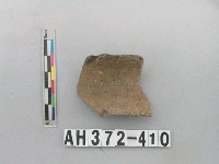 藏品(灰褐色夾砂陶口緣)的圖片